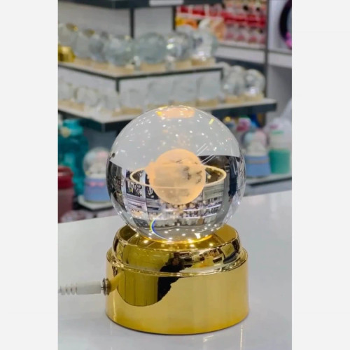 گوی کره شیشه ای زیبا با پایه طلایی و چرخشی 6 سانت